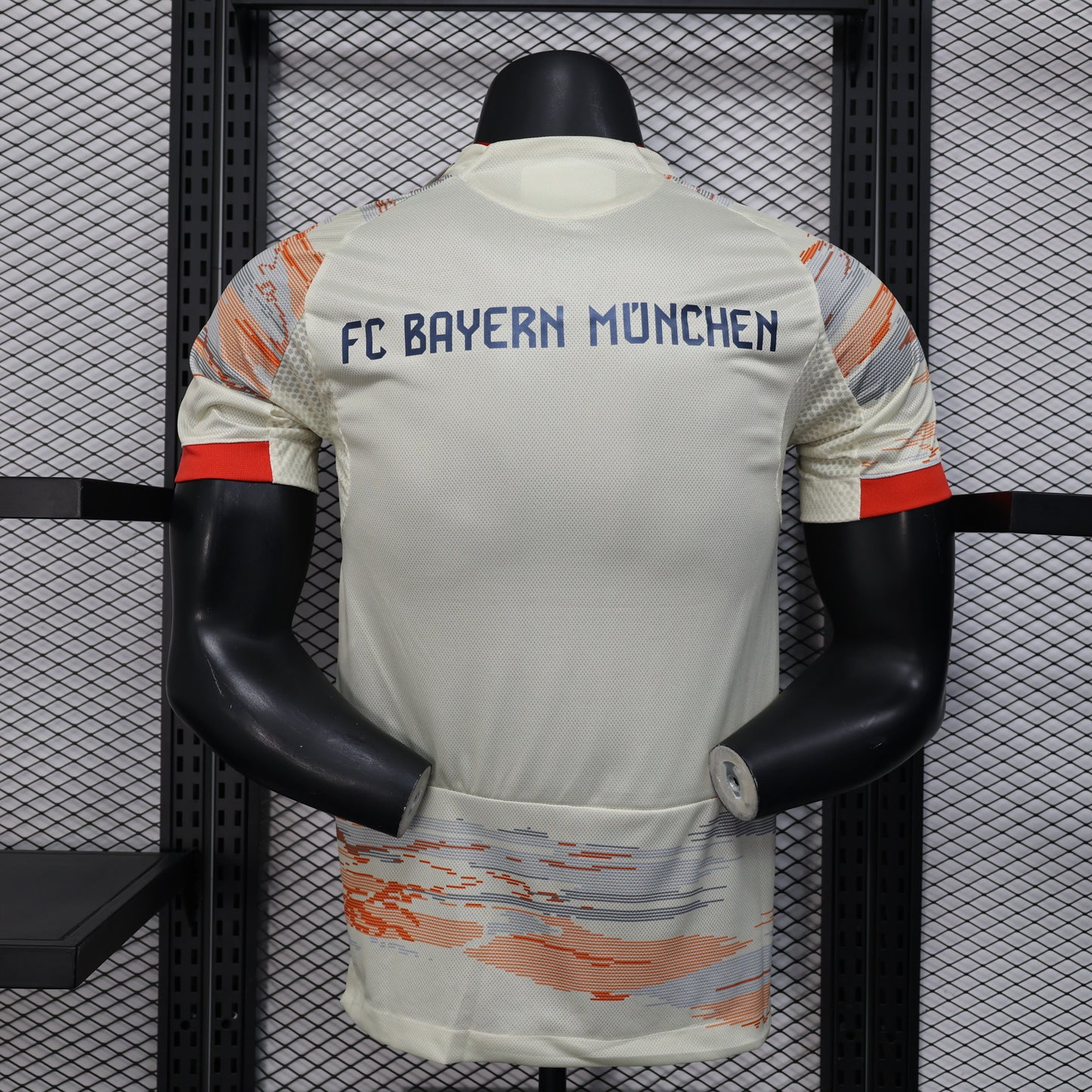2025/26 Bayern Munich Away Player Version Jersey - Body Orange Grey Horizontal Brush Stroke Graphic - Red Side Seam Piping Red Sleeve Cuffs Black Shoulder Stripes - FC Bayern Crest - Deutsche Telekom T Logo