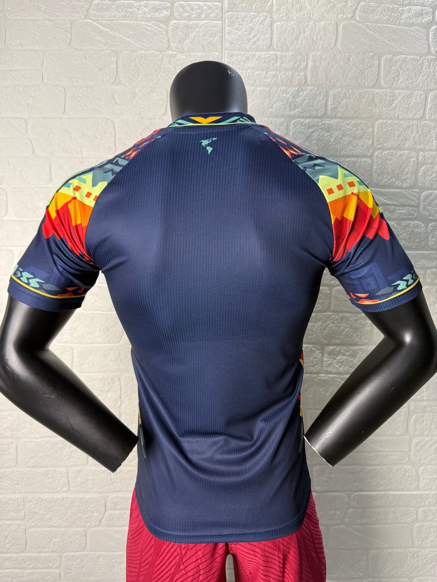 2025/26 Club América Training Player Version Jersey - Dark Navy Blue Body Multicolour Aztec Zigzag Graphic Upper Chest -Gold Three Stripes - Club América Crest - Caliente Principal Sponsor