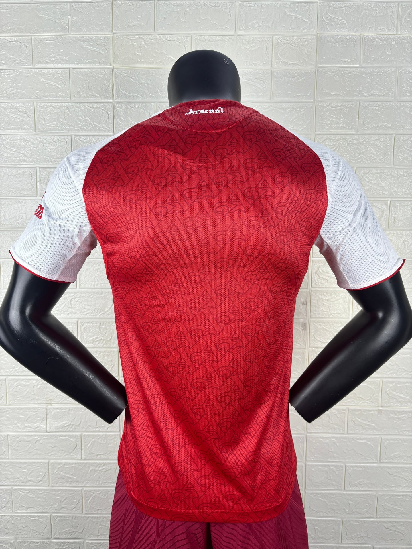2025/26 Arsenal Home Player Version Jersey - Red Body White Sleeves Diamond Mesh Texture Red Side Seam Piping - White Three Stripes Left Chest - Arsenal Shield Crest Right Chest - Emirates Fly Better Principal Sponsor