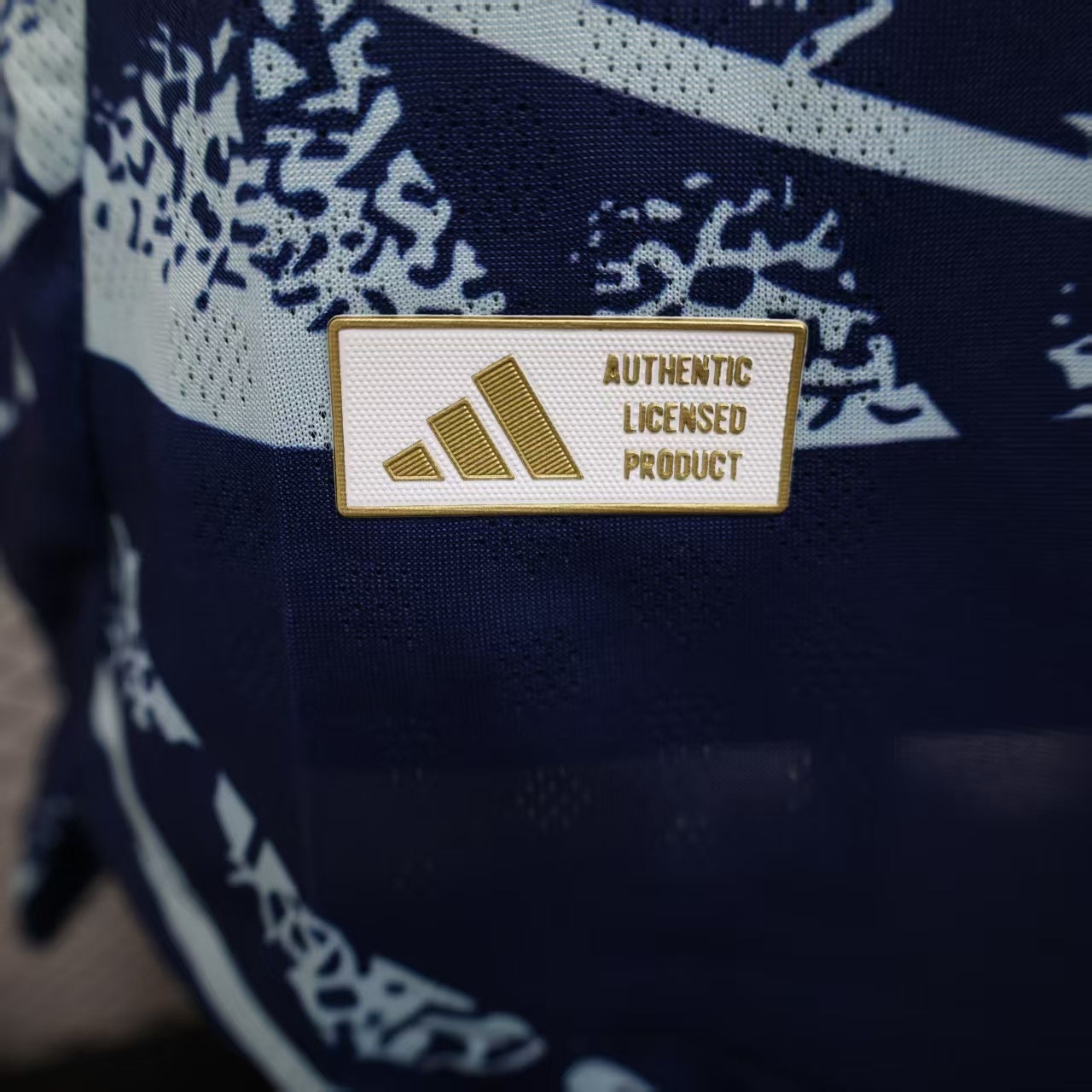 2025/26 Club América Away Player Version Jersey - Dark Navy Blue Body All-Over Aztec Eagle Deity Embossed Graphic - Yellow-Green Three Stripes - Club América Crest - Caliente.mx Principal Sponsor