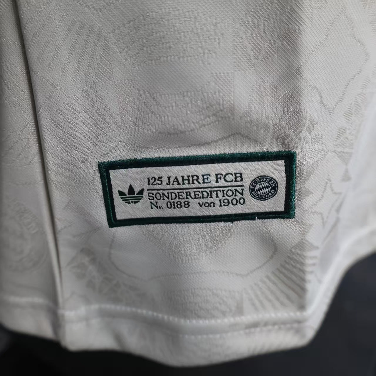 2025/26 Bayern Munich Beer Edition Player Version Jersey - Off-White Body - Dark Green Crew Neck Trim & Sleeve Cuffs - Bayern Munich Dark Green Special Crest - Deutsche Telekom T Dark Green Principal Sponsor