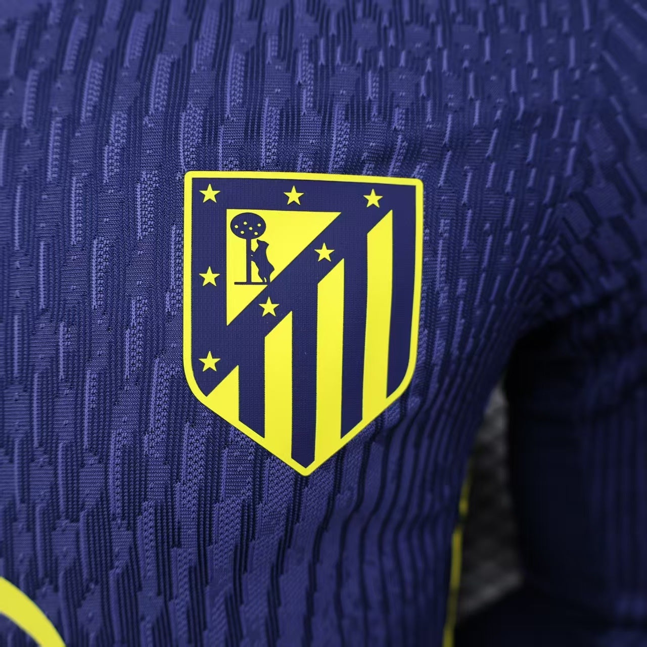2025/26 Atlético Madrid Away Long Sleeve Player Version Jersey - Deep Navy Body All-Over Subtle Vertical Pinstripe Tonal Texture Deep Navy V-Neck Collar - Nike Volt Yellow-Green Swoosh - Atlético Madrid Official Shield Crest Volt Yellow-Green - Men's