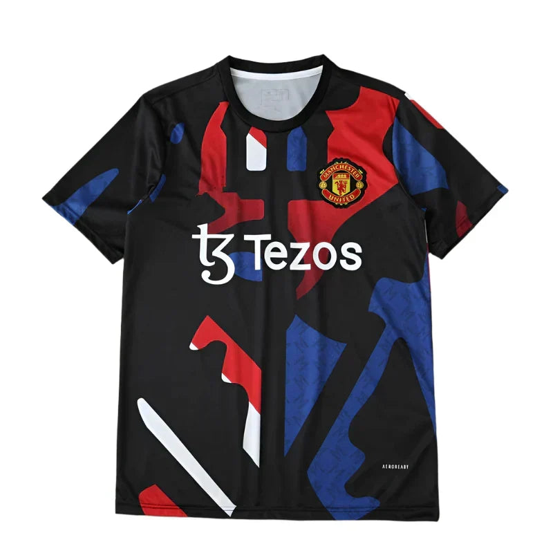 Manchester United Training Shirt Fan Version 2024/25 – Black Red Blue Geometric Tezos Pre-Match Top
