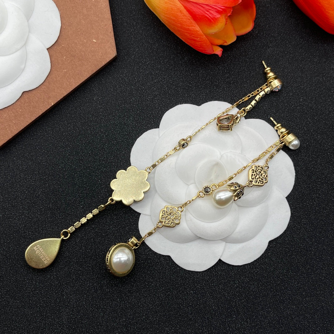 Alexander McQueen Crystal Charm Long Drop earrings in Gold Tone, detail view 6