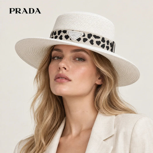 Prada hat worn by a female model, showing the hat shape and detailing.