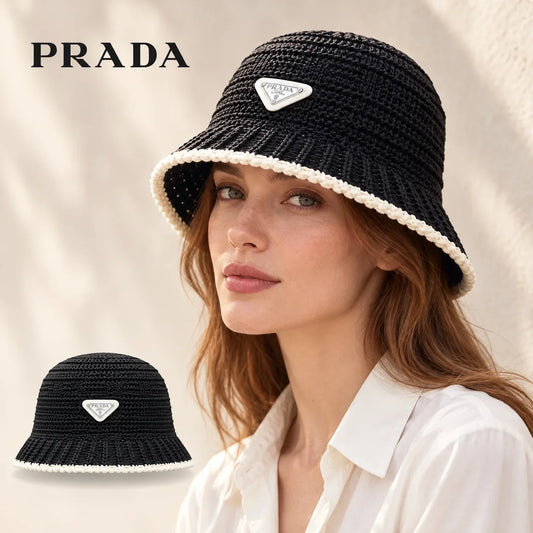 PRADA bucket hat worn by a female model, with product detail inset.
