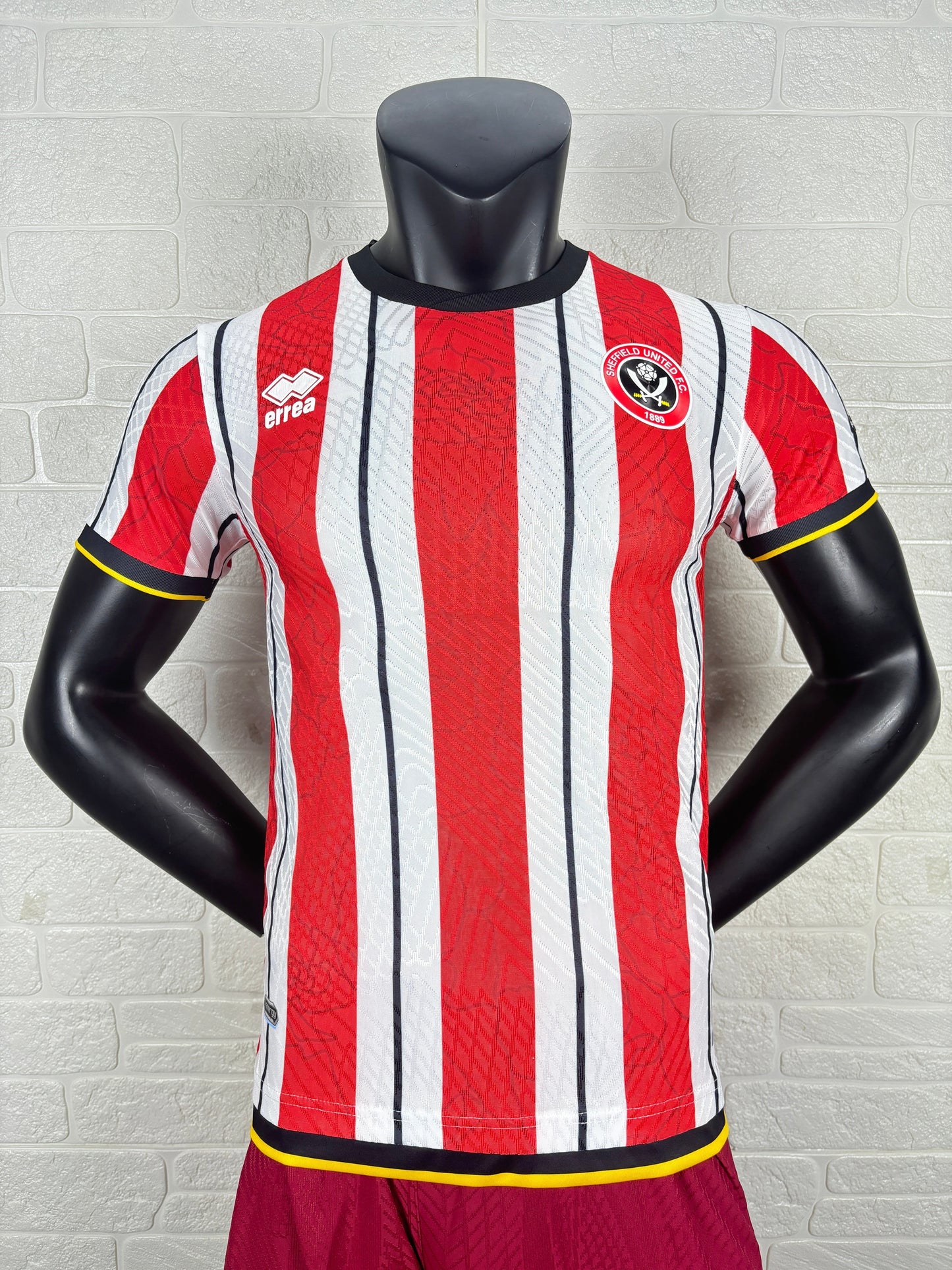2025/26 Sheffield United Home Player Version Jersey - Erreà - Red White Vertical Wide Stripe - Black Crew Neck Collar - Black Sleeve Cuff & Hem Band with Yellow Piping