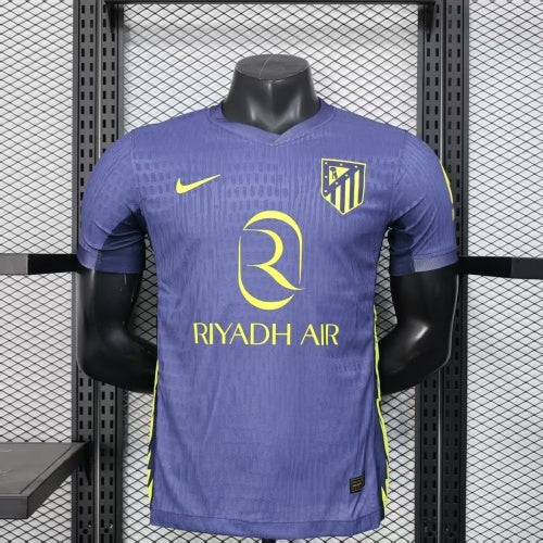 2025/26 Atlético Madrid Away Player Version Jersey - Deep Purple-Navy Body All-Over Subtle Geometric Tonal Texture Deep Purple-Navy V-Neck Collar - Nike Volt Yellow-Green Swoosh - Atlético Madrid Official Shield Crest Volt Yellow-Green