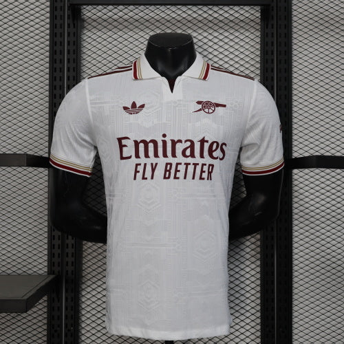 2025/26 Arsenal Away Player Version Jersey - White Body All-Over Subtle Tonal Graphic Texture Deep Maroon Polo Collar Multi-Stripe Gold Red White Trim - Originals Trefoil - Arsenal Cannon Crest - Emirates Fly Better - Men's