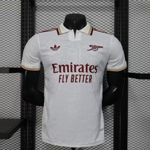 2025/26 Arsenal Away Player Version Jersey - White Body All-Over Subtle Tonal Graphic Texture Deep Maroon Polo Collar Gold Cream Stripe Trim - Originals Trefoil - Arsenal Cannon Crest - Emirates Fly Better - Men's