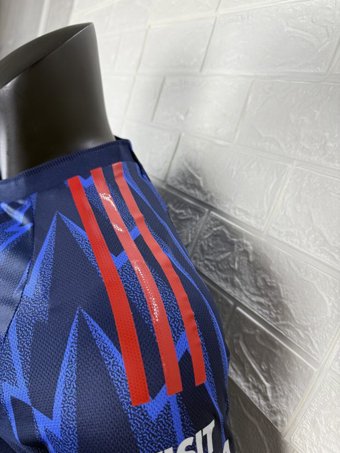 2025/26 Arsenal Away Player Version Jersey - Dark Navy Blue Body All-Over Blue Lightning Bolt Zigzag Graphic - White Three Stripes - Arsenal Cannon Crest - Emirates Fly Better Principal Sponsor