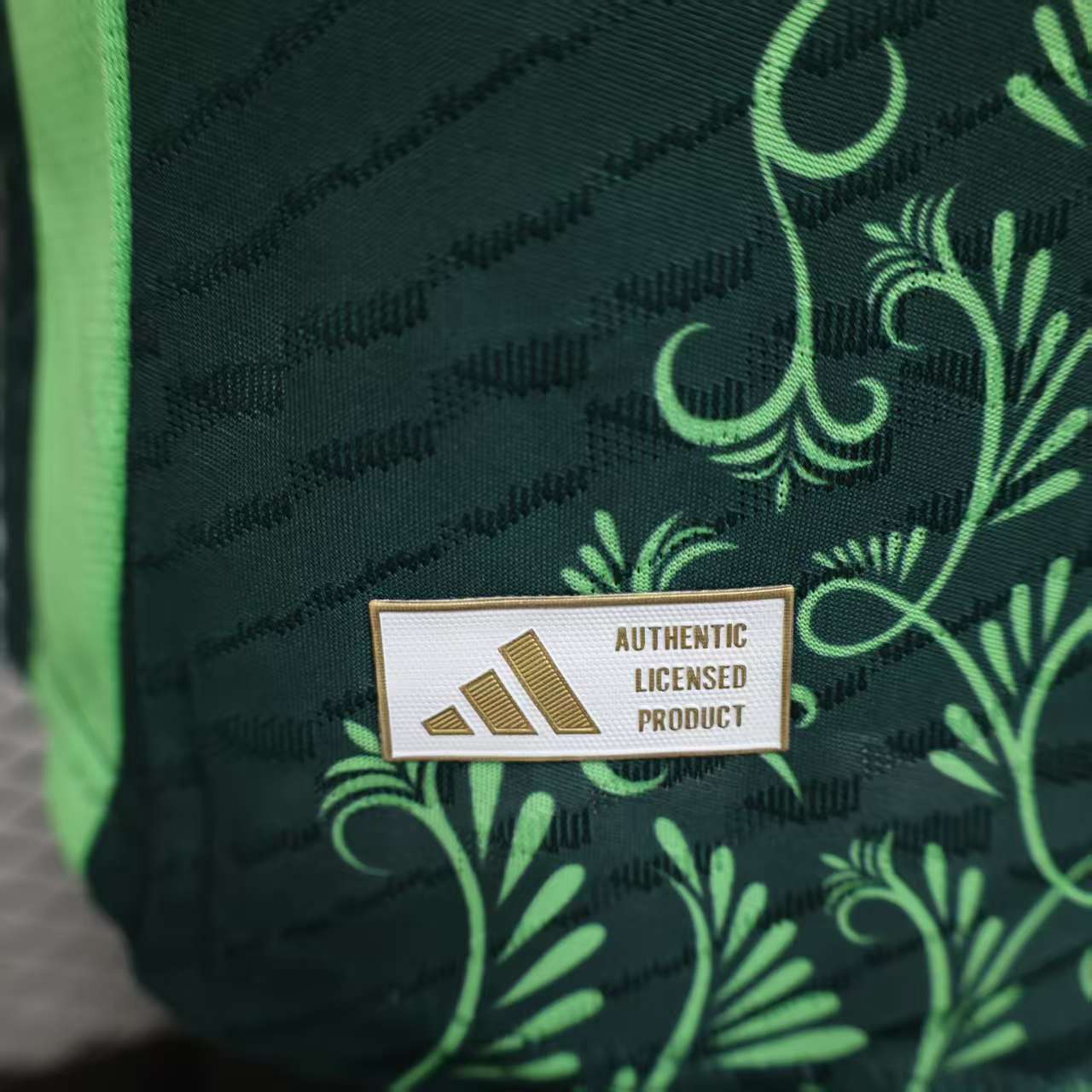 2025/26 Algeria Green Player Version Jersey - Dark Green Body All-Over Arabic-Inspired Floral Vine Embossed Texture - Adidas - Neon Green Side Seam Piping & Crew Neck Trim - Two Gold Stars - Algeria National Team Crest