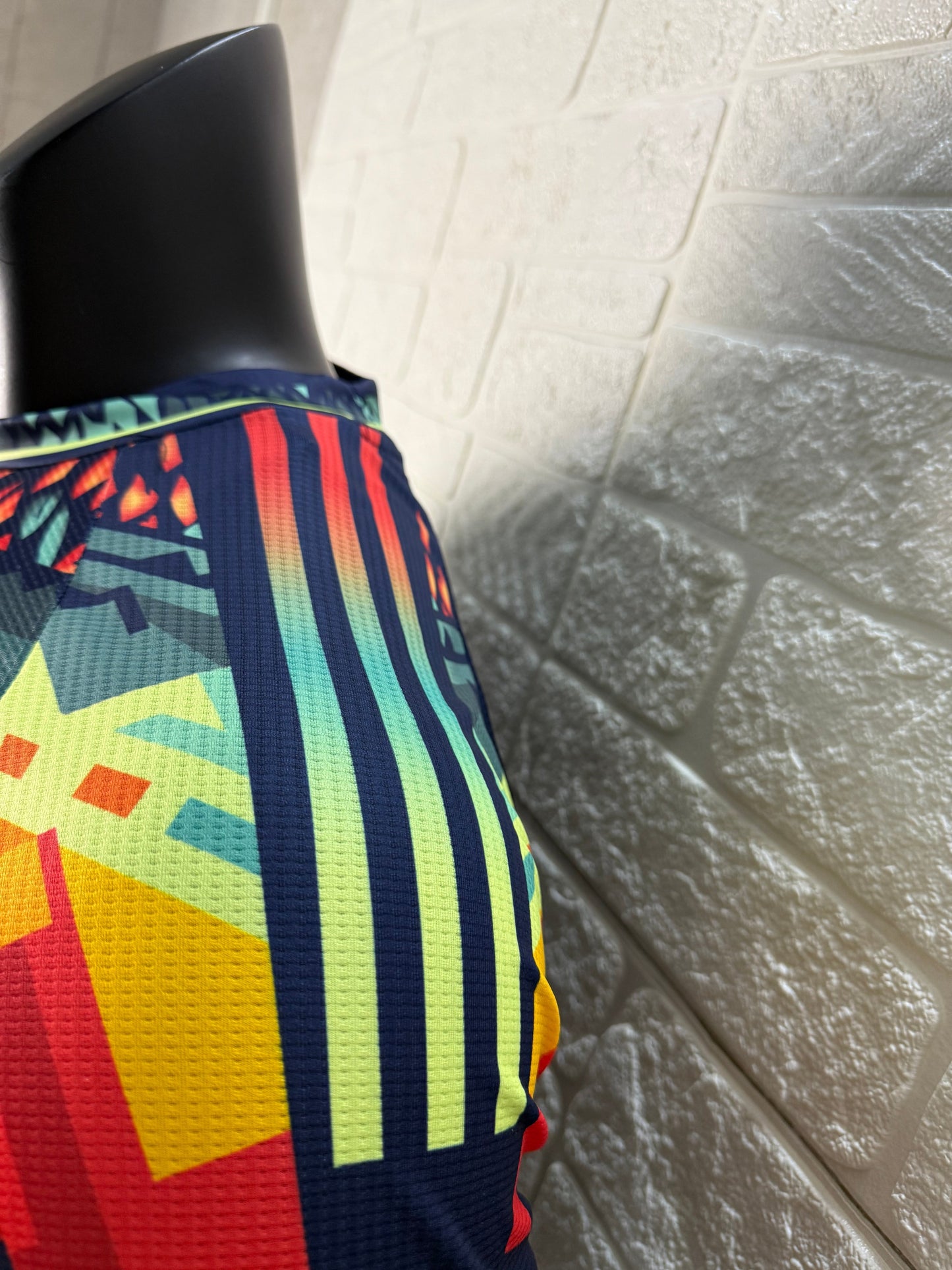 2025/26 Club América Training Player Version Jersey - Dark Navy Blue Body Multicolour Aztec Zigzag Graphic Upper Chest -Gold Three Stripes - Club América Crest - Caliente Principal Sponsor