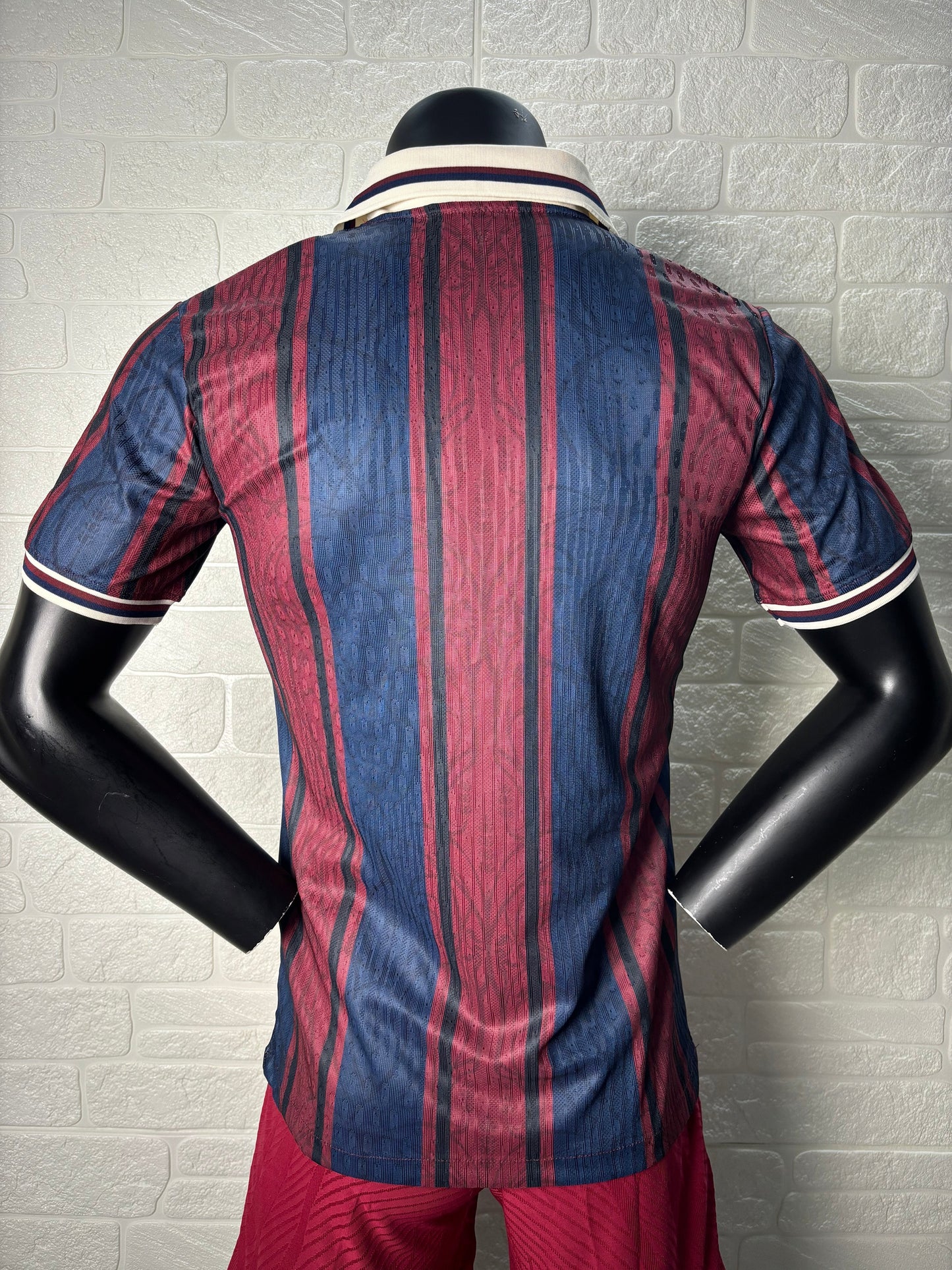 2025/26 FC Barcelona 125th Anniversary Edition Player Version Jersey - Dark Navy Blue & Deep Red Vertical Stripe - White V-Neck Collar - Gold Barça Script - Vintage FCB Crest - Clean Chest