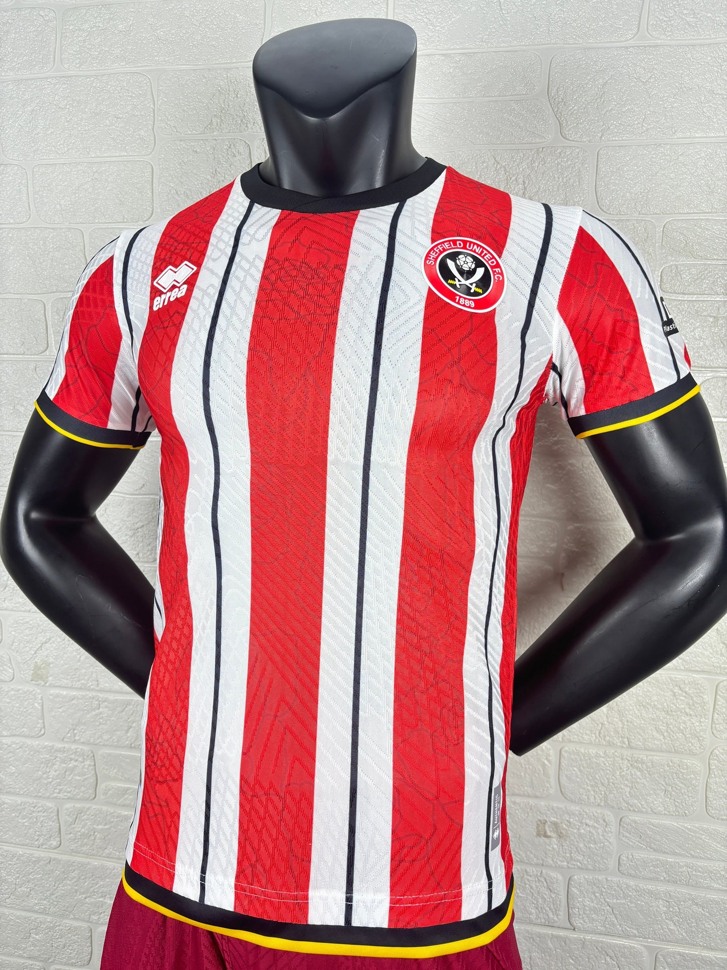 2025/26 Sheffield United Home Player Version Jersey - Erreà - Red White Vertical Wide Stripe - Black Crew Neck Collar - Black Sleeve Cuff & Hem Band with Yellow Piping