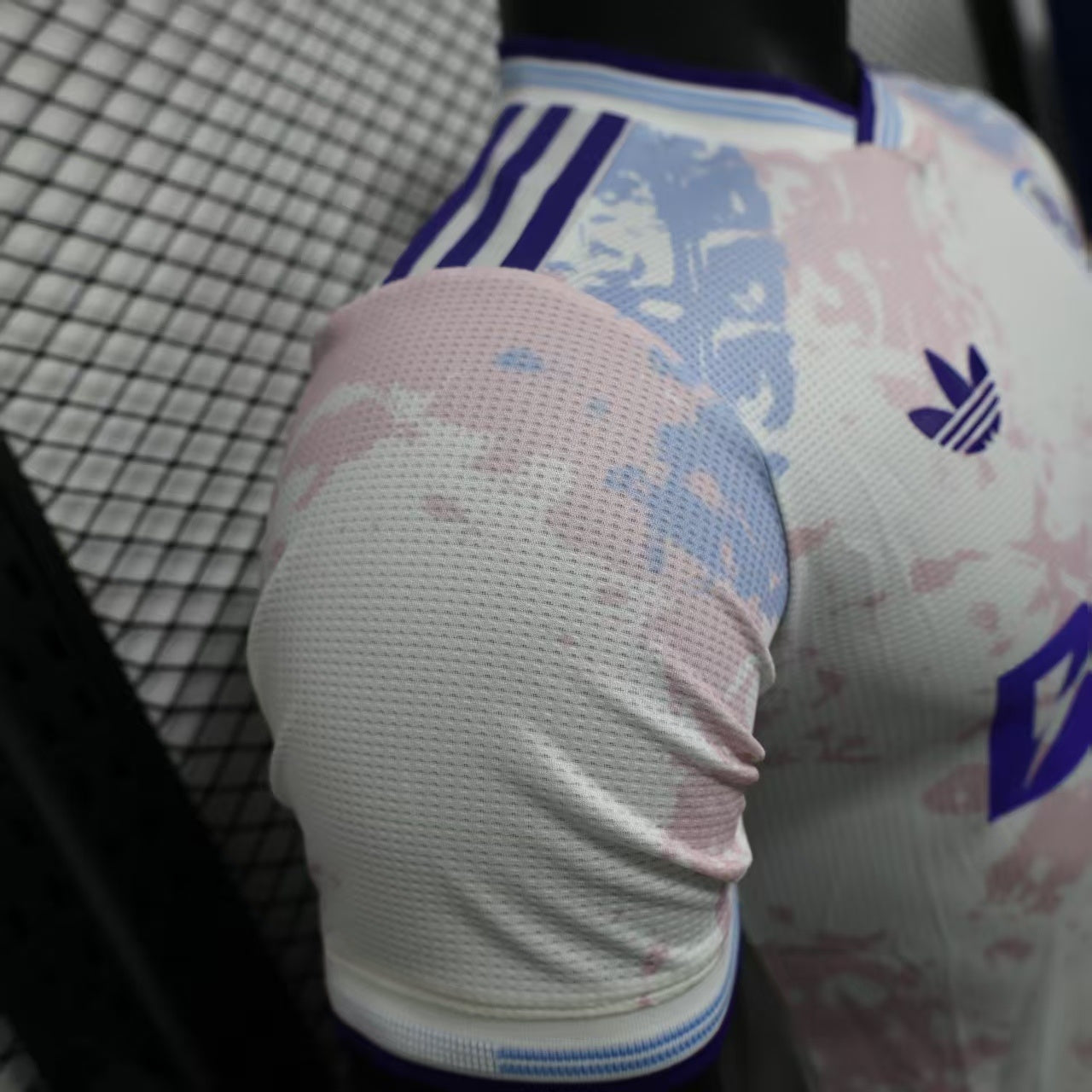2025/26 Aston Villa Away Player Version Jersey - White Body All-Over Blue Pink Watercolour Wash Camo Graphic Dark Navy V-Neck Collar Dark Navy Sleeve Cuff Trim - Originals Trefoil - Aston Villa Lion Shield Crest - Betano - Men's