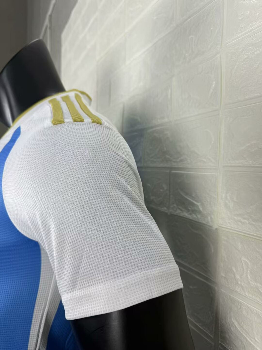 2025/26 Argentina Home Player Version Jersey - White Body Wide Sky Blue Central Vertical Stripe Fine Grid Texture Three Gold Stars Gold Collar Trim - Gold Three Stripes - AFA Square Crest