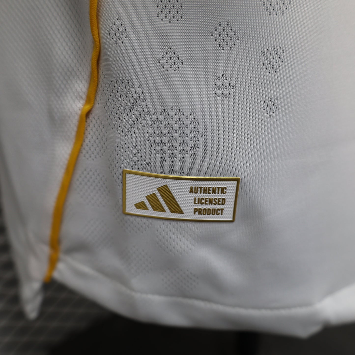2025/26 Real Madrid Home Player Version Jersey -  White Grey Tonal Diamond Honeycomb Texture - Gold Yellow Side Seam Piping - Emirates Fly Better