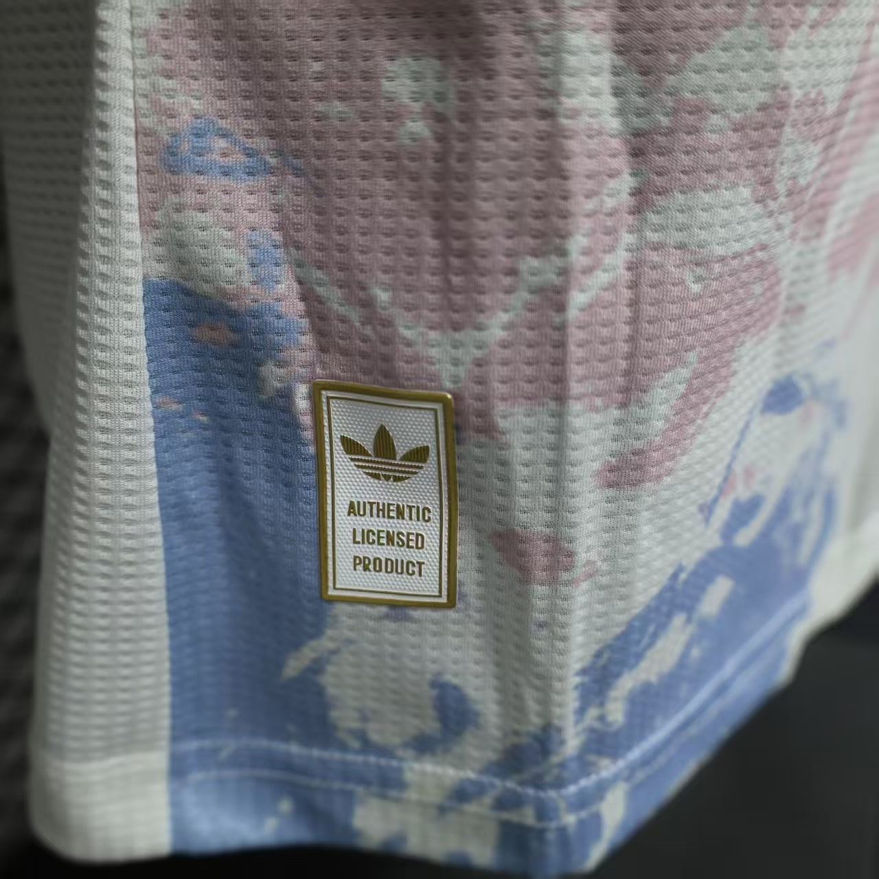 2025/26 Aston Villa Away Player Version Jersey - White Body All-Over Blue Pink Watercolour Wash Camo Graphic Dark Navy V-Neck Collar Dark Navy Sleeve Cuff Trim - Originals Trefoil - Aston Villa Lion Shield Crest - Betano - Men's