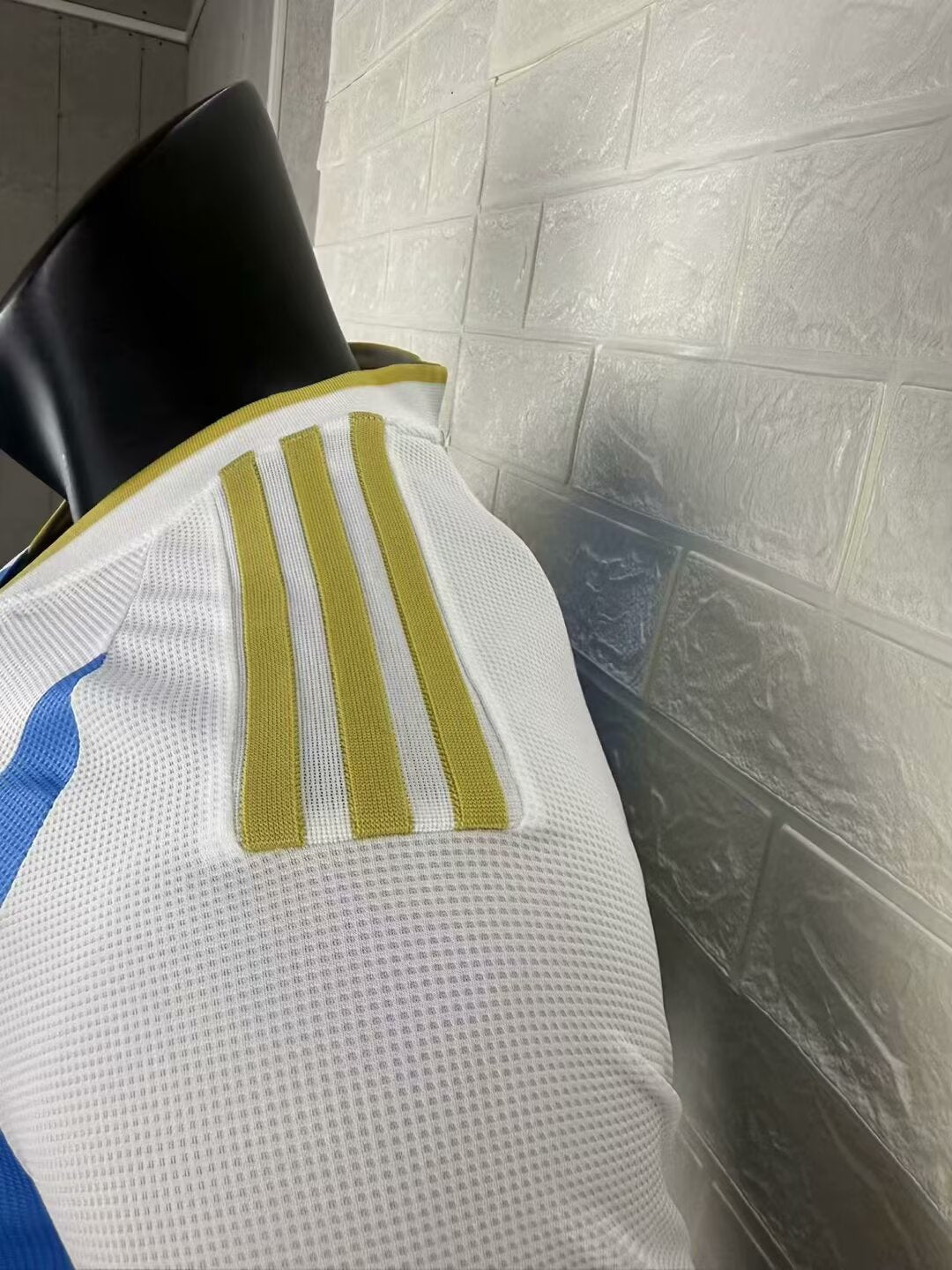 2025/26 Argentina Home Player Version Jersey - White Body Wide Sky Blue Central Vertical Stripe Fine Grid Texture Three Gold Stars Gold Collar Trim - Gold Three Stripes - AFA Square Crest
