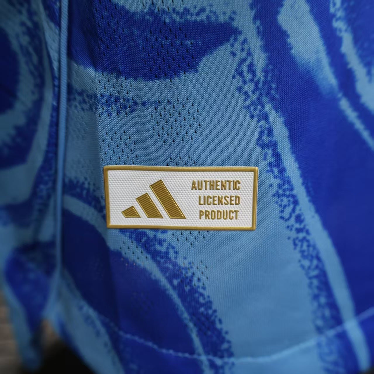 2025/26 Tigres UANL Away Player Version Jersey - Royal Blue Body - All-Over Tiger Face Tonal Graphic Print - Blue V-Neck Collar - CEMEX White Sponsor