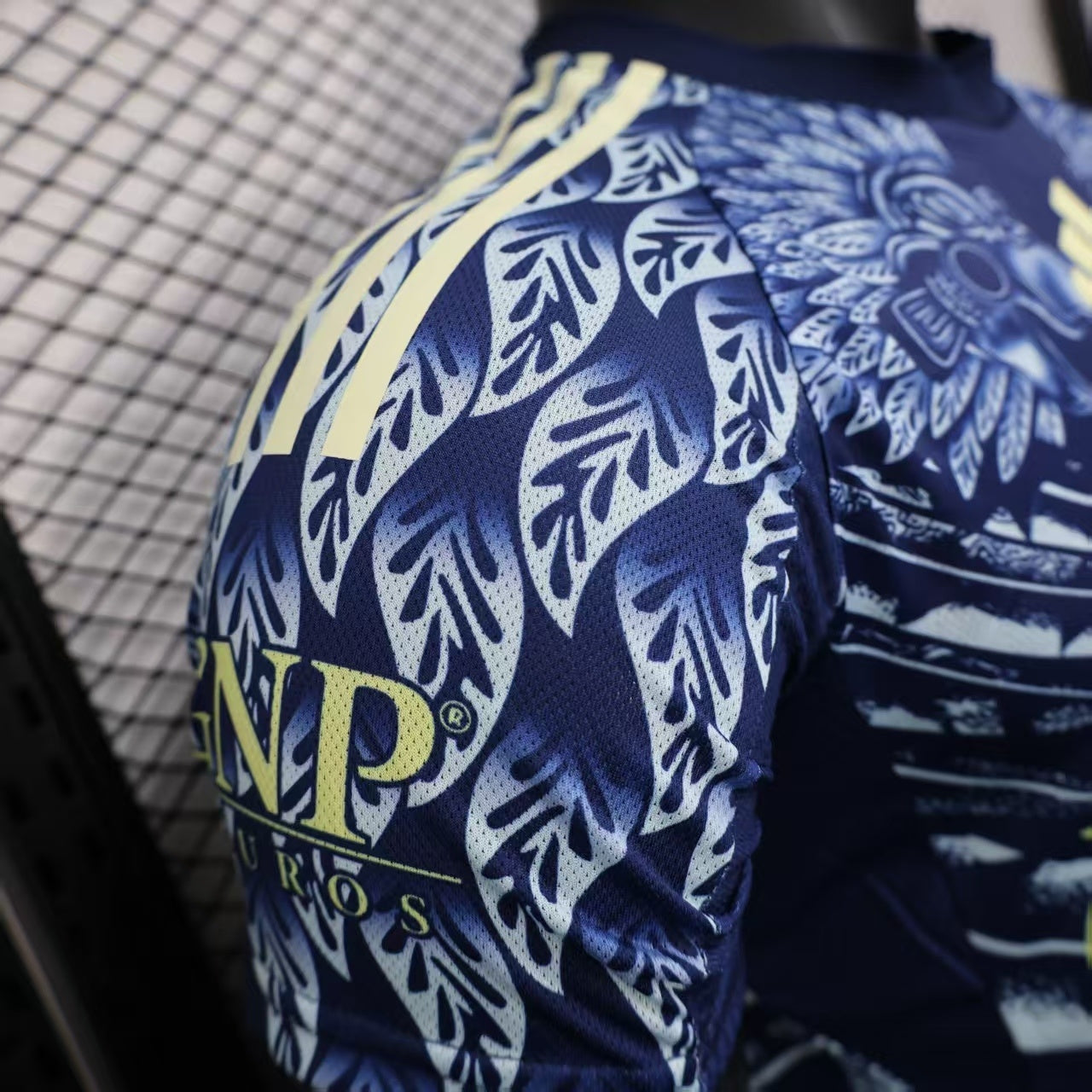 2025/26 Club América Away Player Version Jersey - Dark Navy Blue Body All-Over Aztec Eagle Deity Embossed Graphic -  Yellow-Green Three Stripes - Club América Crest - Caliente.mx Principal Sponsor