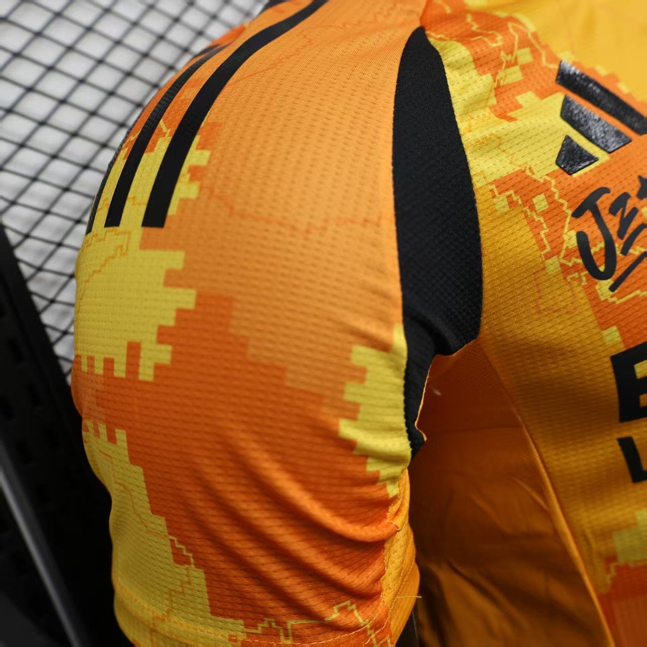 2025/26 Paris FC Away Player Version Jersey -  Orange Yellow Pixel Camo Map Pattern - Bahrain Victorious - Black Sleeves
