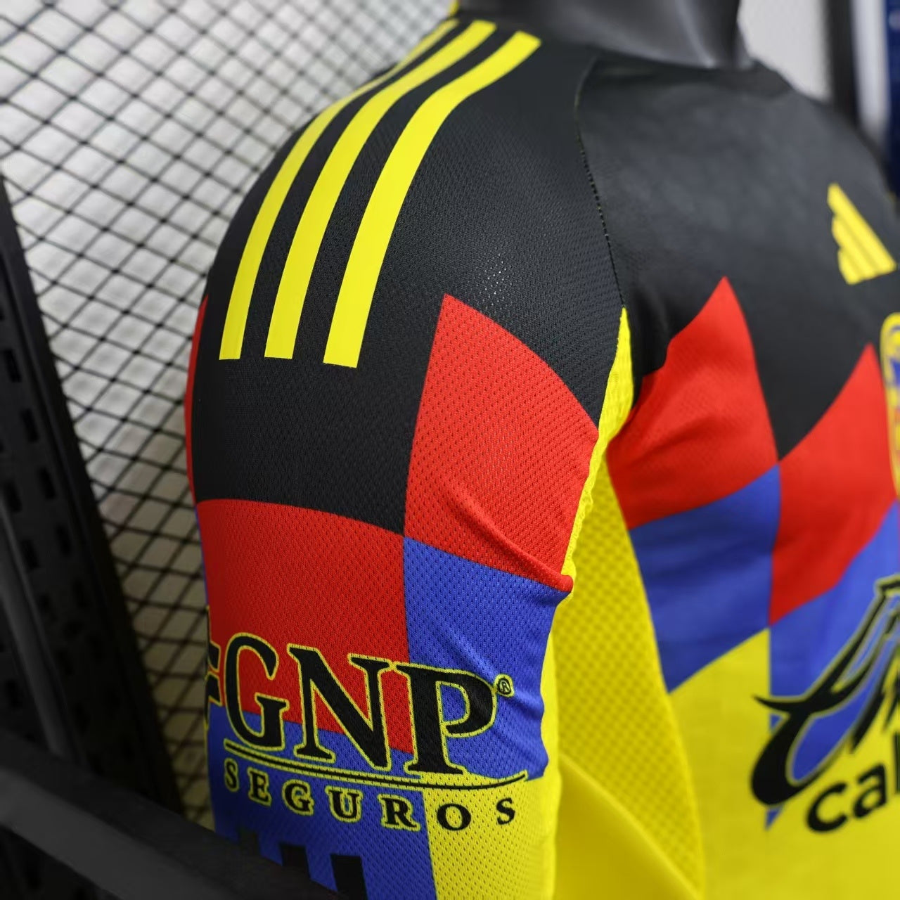 2025/26 Club América Home Long Sleeve Player Version Jersey - Yellow Body Black Upper Chest Red Blue Geometric Colour Block Panels -Yellow Long Sleeves - Club América Crest - Caliente.mx Principal Sponsor