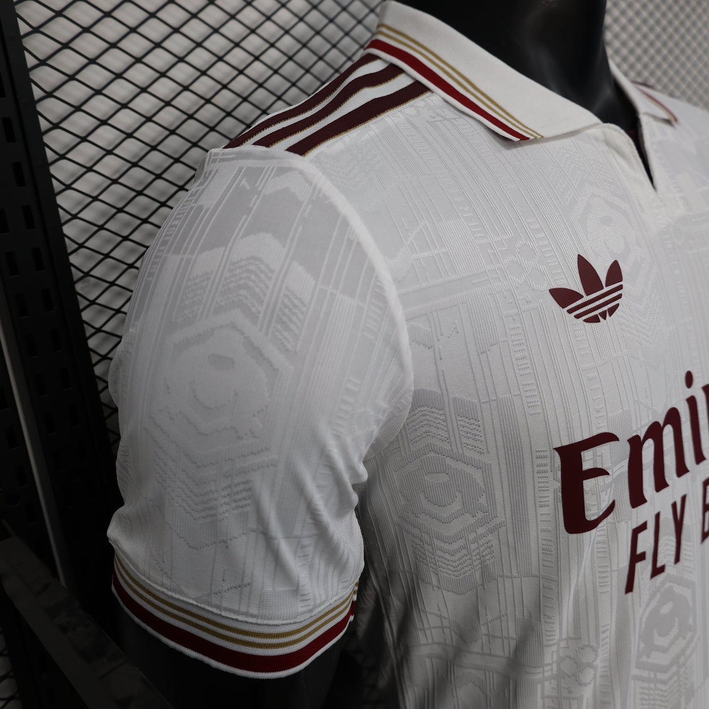 2025/26 Arsenal Away Player Version Jersey - White Body All-Over Subtle Tonal Graphic Texture Deep Maroon Polo Collar Multi-Stripe Gold Red White Trim - Originals Trefoil - Arsenal Cannon Crest - Emirates Fly Better - Men's