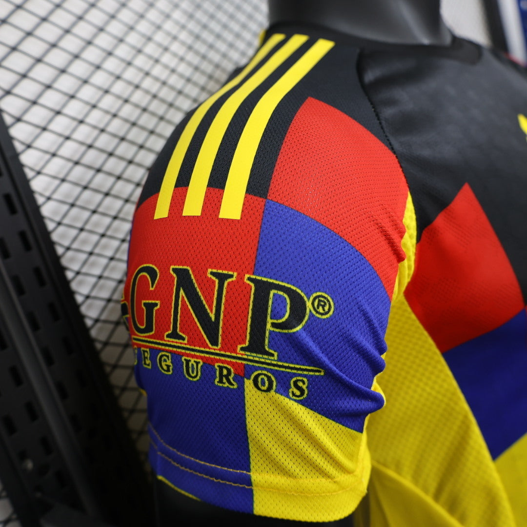 2025/26 Club América Home Player Version Jersey - Yellow Body Black Upper Chest Red Blue Geometric Colour Block Panels - Yellow Three Stripes - Club América Crest - Caliente.mx Principal Sponsor