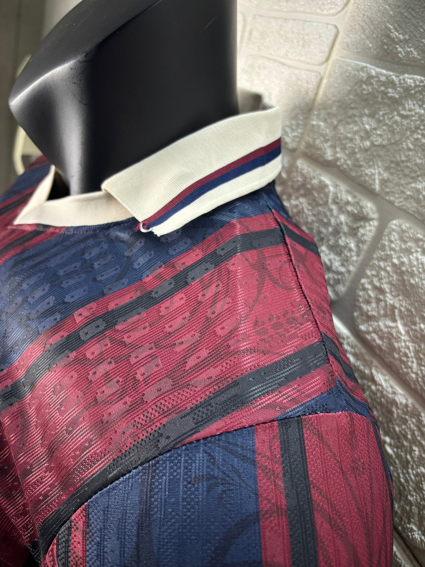 2025/26 FC Barcelona 125th Anniversary Edition Player Version Jersey - Dark Navy Blue & Deep Red Vertical Stripe - White V-Neck Collar - Gold Barça Script - Vintage FCB Crest - Clean Chest