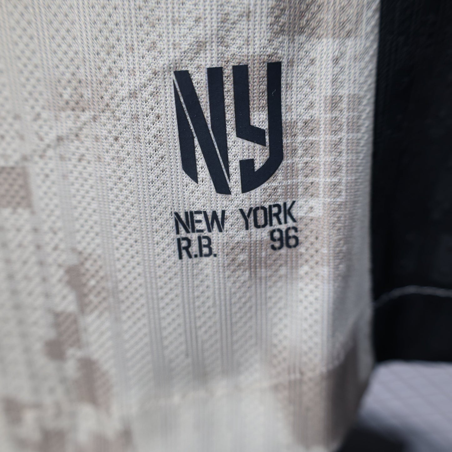 2025/26 New York Red Bulls Away Player Version Jersey - Adidas - Off-White Cream Desert Camouflage Pattern - Black Side Panels - Red Bull Double Bull Yellow Sun Crest
