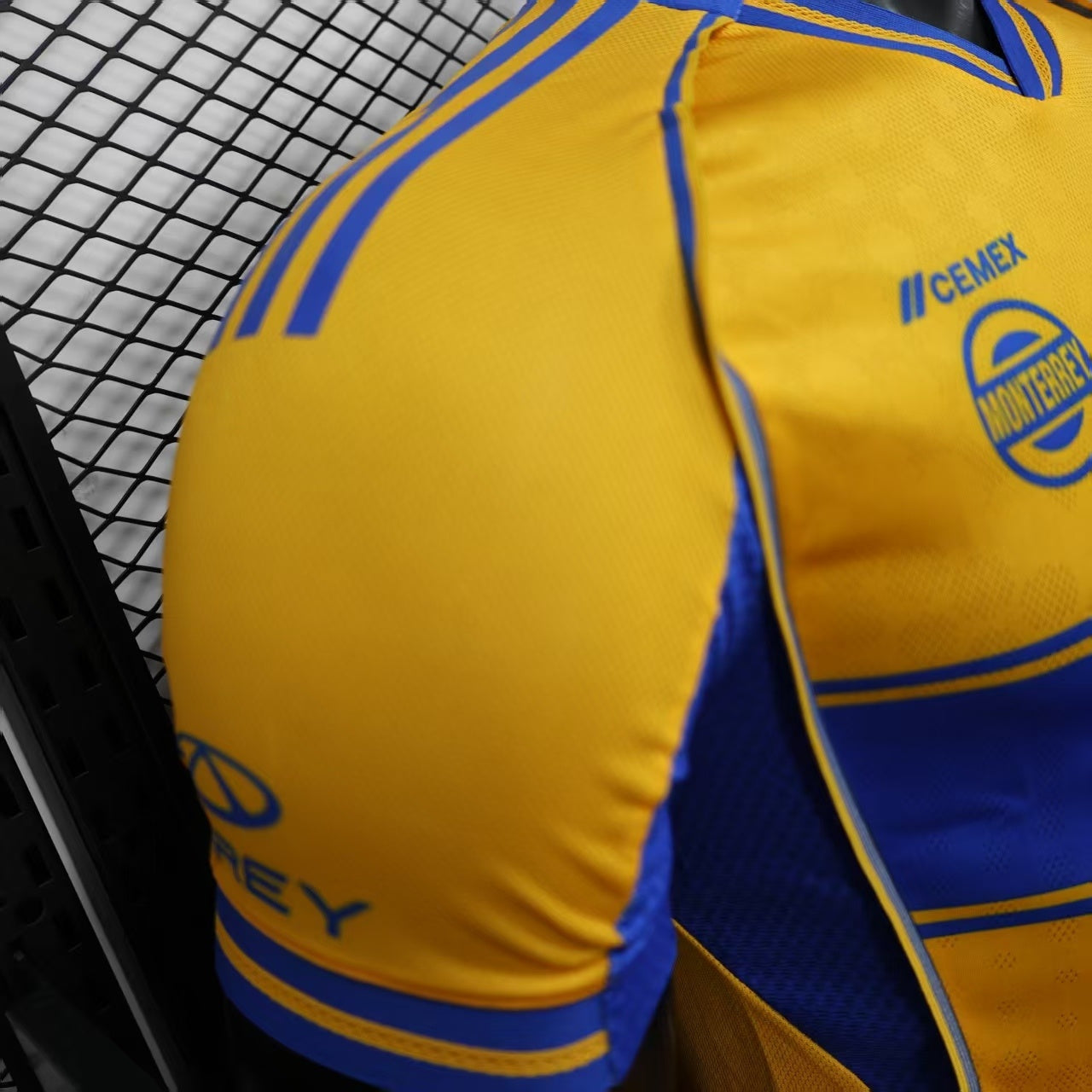 2025/26 Tigres UANL Home Player Version Jersey - Gold Yellow Body - Blue Horizontal Stripe Band - Blue Sleeves - CEMEX Blue Sponsor - Tigres U Crest