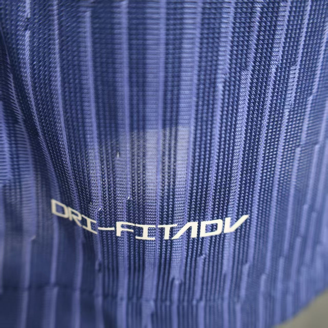 2025/26 Atlético Madrid Away Long Sleeve Player Version Jersey - Deep Navy Body All-Over Subtle Vertical Pinstripe Tonal Texture Deep Navy V-Neck Collar - Nike Volt Yellow-Green Swoosh - Atlético Madrid Official Shield Crest Volt Yellow-Green - Men's