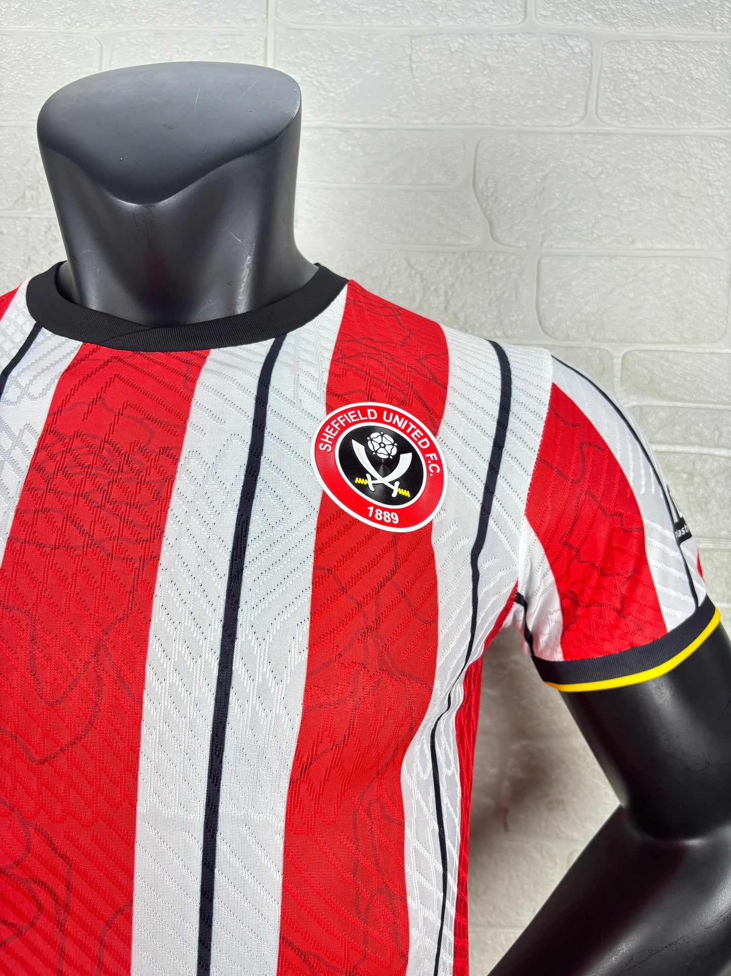 2025/26 Sheffield United Home Player Version Jersey - Erreà - Red White Vertical Wide Stripe - Black Crew Neck Collar - Black Sleeve Cuff & Hem Band with Yellow Piping