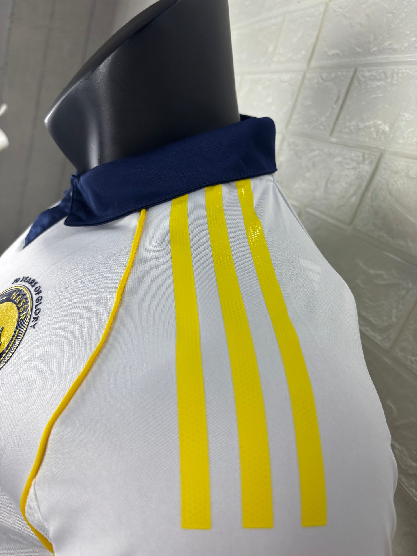2025/26 Al-Nassr Away Player Version Jersey - White Body - Dark Navy Blue Polo Collar - Gold Yellow Side Seam Piping - KAFD Gold Yellow Sponsor