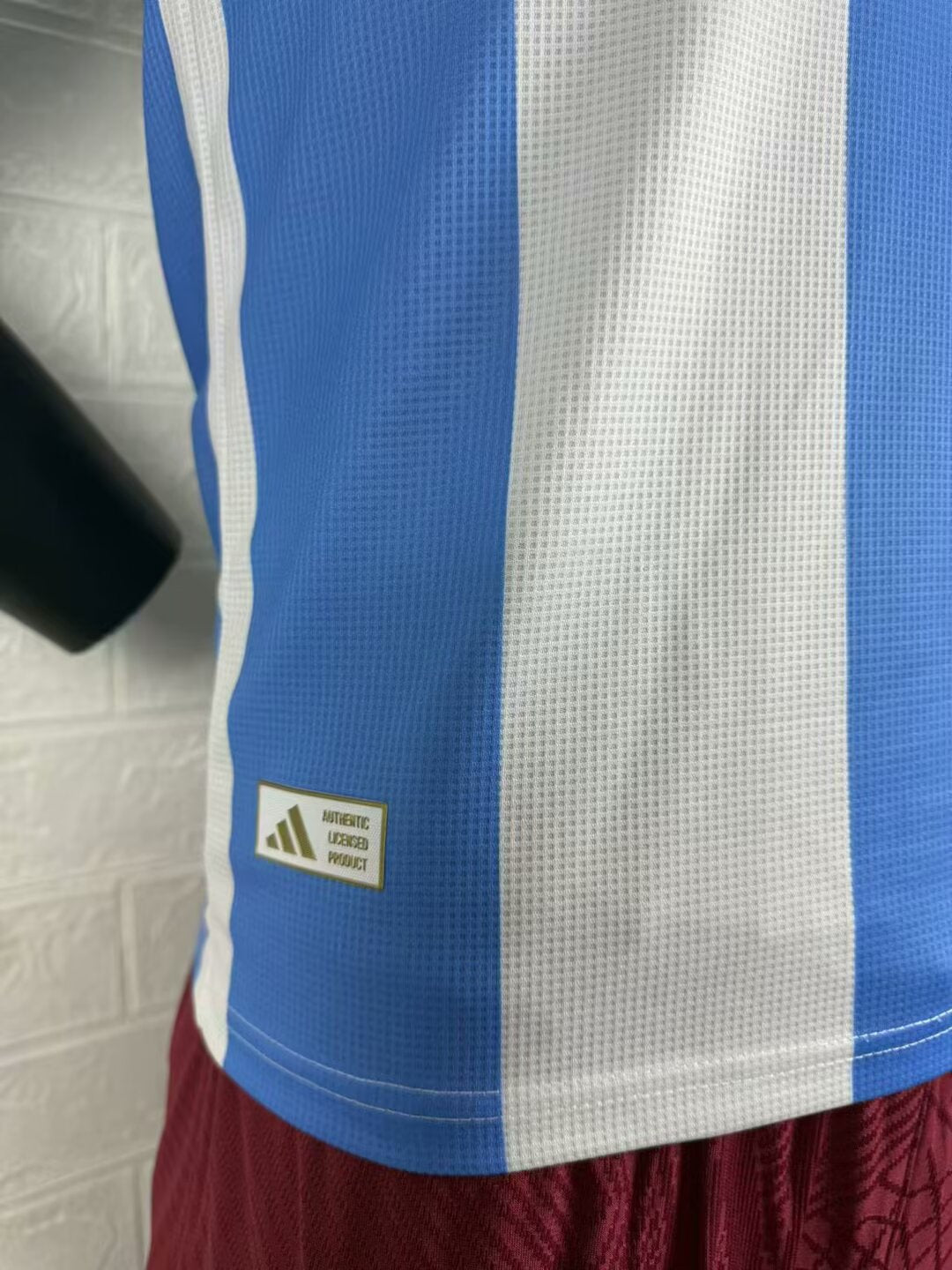 2025/26 Argentina Home Player Version Jersey - White Body Wide Sky Blue Central Vertical Stripe Fine Grid Texture Three Gold Stars Gold Collar Trim - Gold Three Stripes - AFA Square Crest