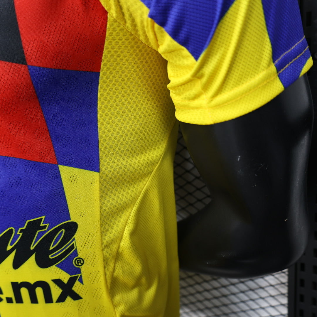 2025/26 Club América Home Player Version Jersey - Yellow Body Black Upper Chest Red Blue Geometric Colour Block Panels - Yellow Three Stripes - Club América Crest - Caliente.mx Principal Sponsor