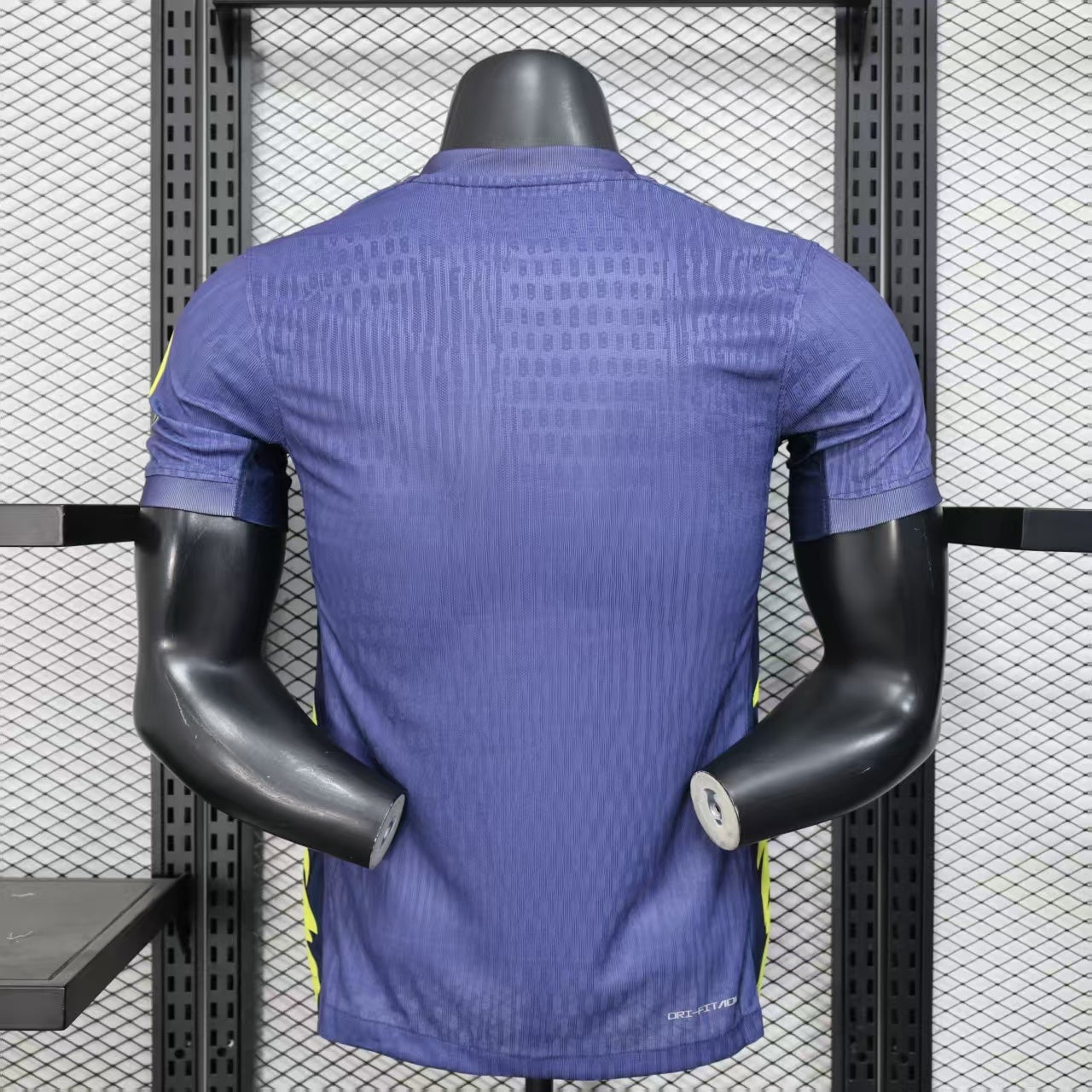2025/26 Atlético Madrid Away Player Version Jersey - Deep Purple-Navy Body All-Over Subtle Geometric Tonal Texture Deep Purple-Navy V-Neck Collar - Nike Volt Yellow-Green Swoosh - Atlético Madrid Official Shield Crest Volt Yellow-Green