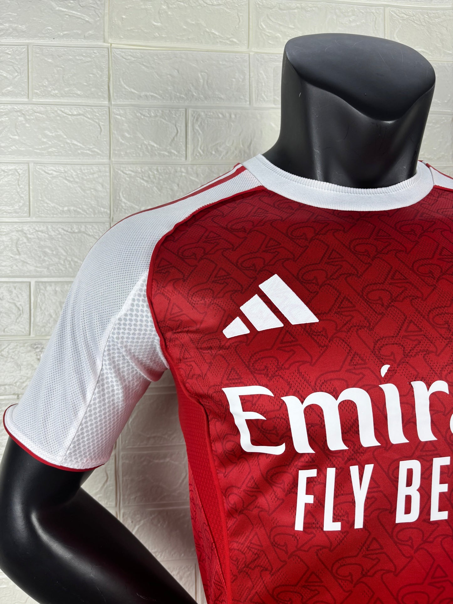 2025/26 Arsenal Home Player Version Jersey - Red Body White Sleeves Diamond Mesh Texture Red Side Seam Piping - White Three Stripes Left Chest - Arsenal Shield Crest Right Chest - Emirates Fly Better Principal Sponsor