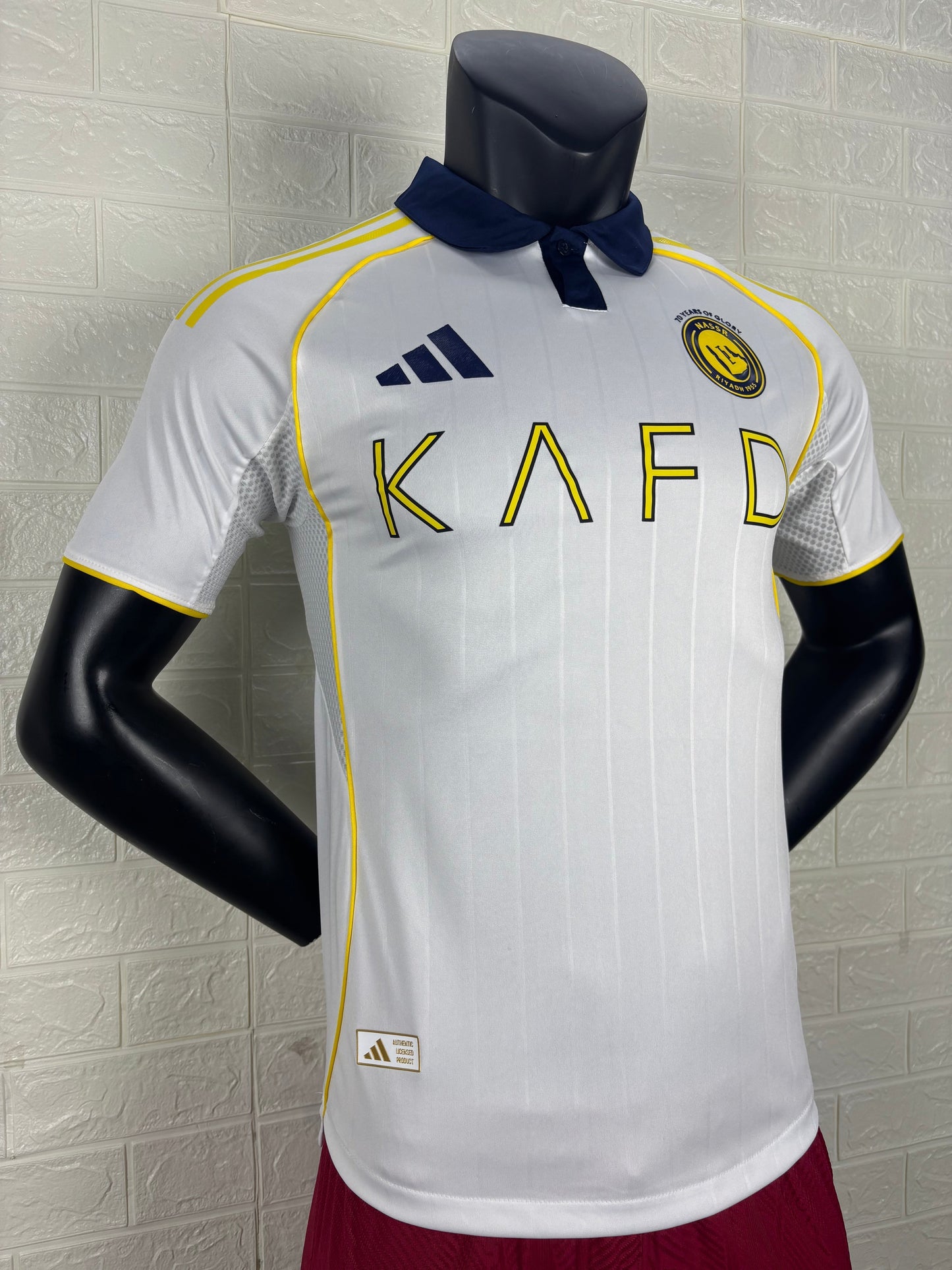 2025/26 Al-Nassr Away Player Version Jersey - White Body - Dark Navy Blue Polo Collar - Gold Yellow Side Seam Piping - KAFD Gold Yellow Sponsor