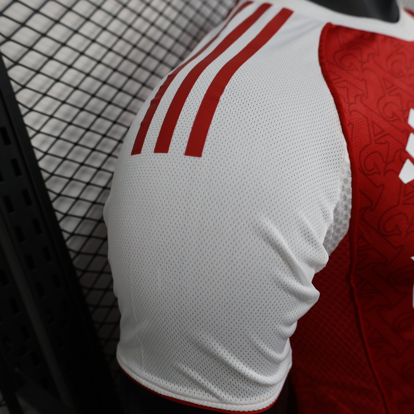2025/26 Arsenal Home Player Version Jersey - Red Body White Sleeves All-Over Subtle Graphic Texture - White Three Stripes - Arsenal Cannon Crest - Emirates Fly Better Principal Sponsor - Men's