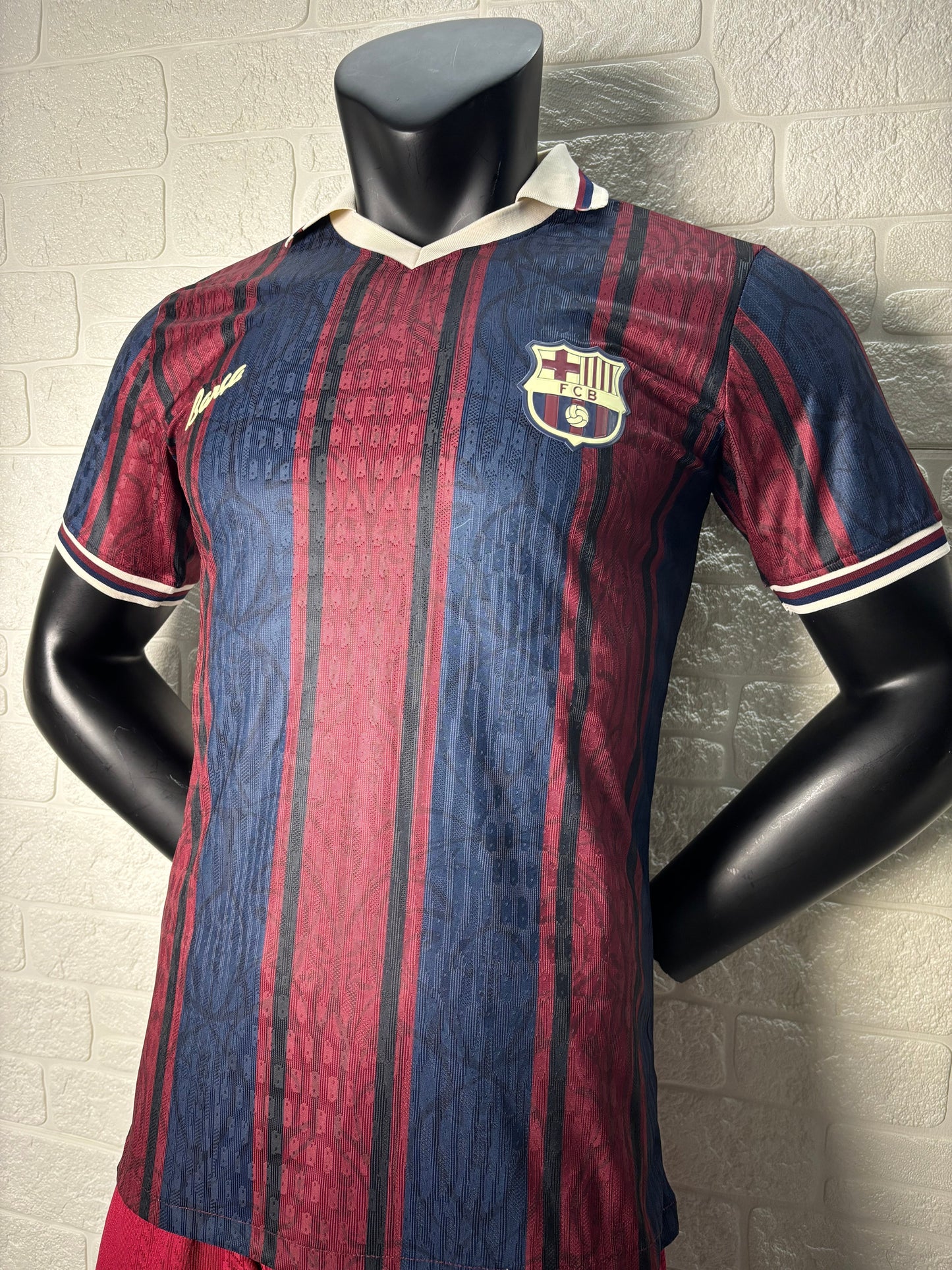 2025/26 FC Barcelona 125th Anniversary Edition Player Version Jersey - Dark Navy Blue & Deep Red Vertical Stripe - White V-Neck Collar - Gold Barça Script - Vintage FCB Crest - Clean Chest
