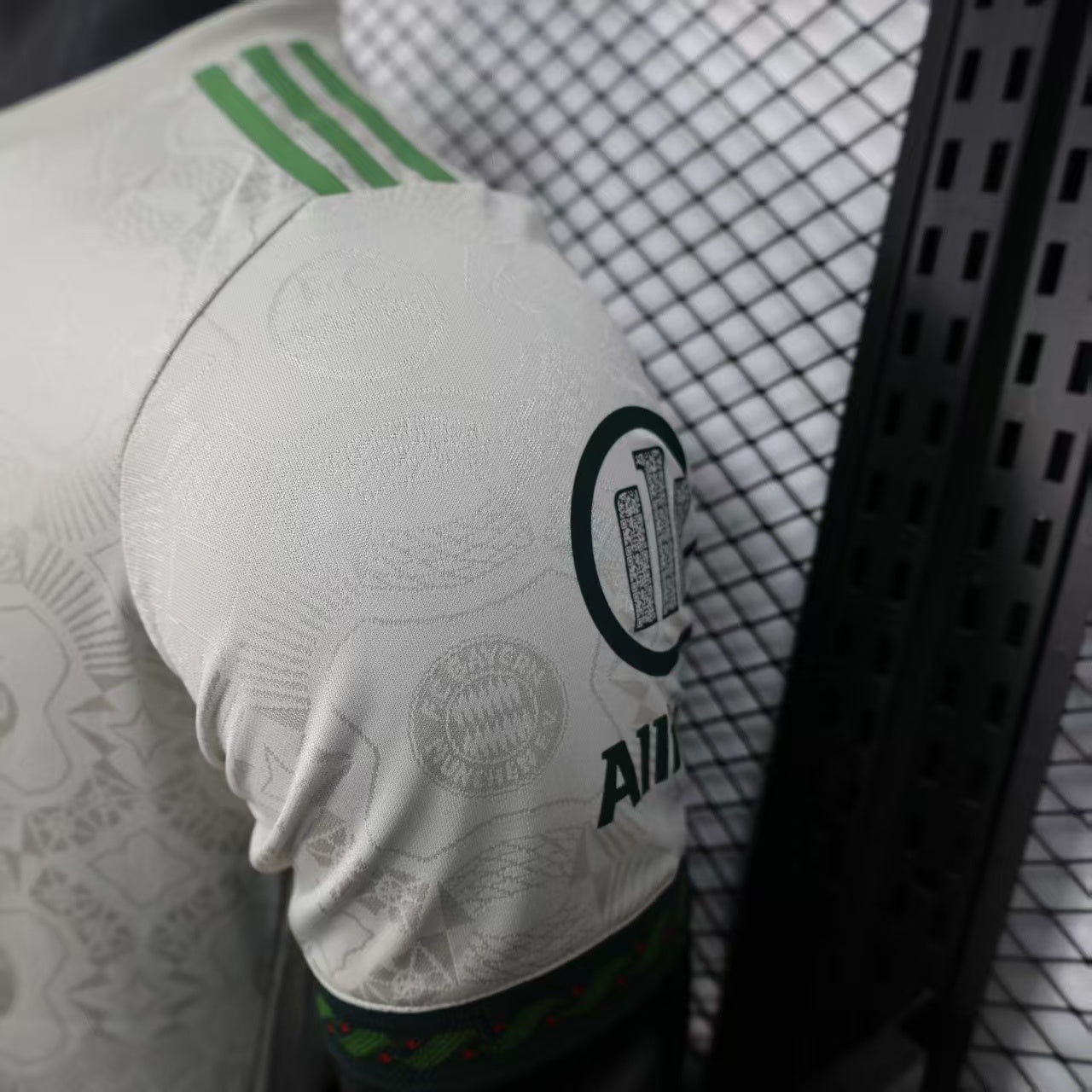 2025/26 Bayern Munich Beer Edition Player Version Jersey - Off-White Body - Dark Green Crew Neck Trim & Sleeve Cuffs - Bayern Munich Dark Green Special Crest - Deutsche Telekom T Dark Green Principal Sponsor