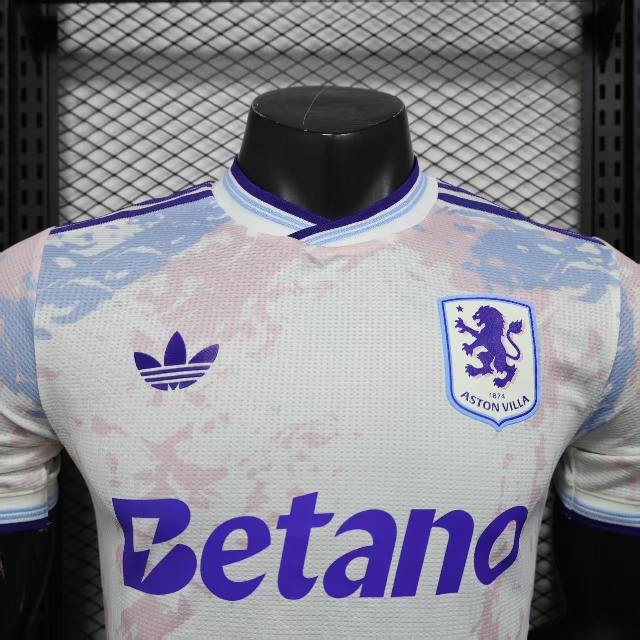 2025/26 Aston Villa Away Player Version Jersey - White Body All-Over Blue Pink Watercolour Wash Camo Graphic Dark Navy V-Neck Collar Dark Navy Sleeve Cuff Trim - Originals Trefoil - Aston Villa Lion Shield Crest - Betano - Men's
