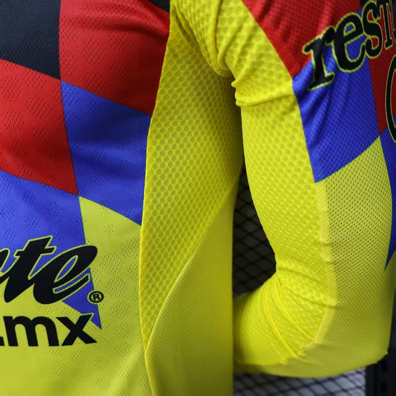 2025/26 Club América Home Long Sleeve Player Version Jersey - Yellow Body Black Upper Chest Red Blue Geometric Colour Block Panels -Yellow Long Sleeves - Club América Crest - Caliente.mx Principal Sponsor