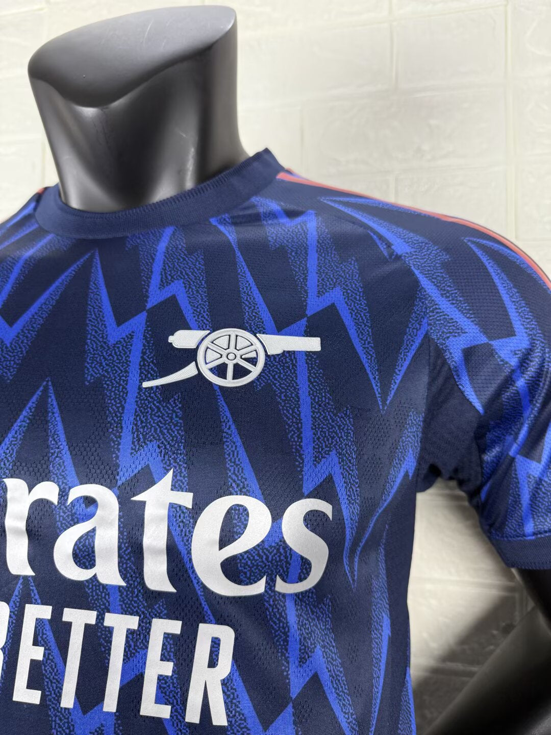 2025/26 Arsenal Away Player Version Jersey - Dark Navy Blue Body All-Over Blue Lightning Bolt Zigzag Graphic - White Three Stripes - Arsenal Cannon Crest - Emirates Fly Better Principal Sponsor