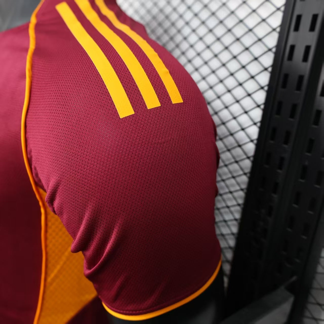 2025/26 AS Roma Home Player Version Jersey - Deep Maroon Body Gold Yellow Side Panel Stripe Seam Detail Gold Yellow Three Stripes - AS Roma Official Shield Crest Gold Yellow Purple She-Wolf Romulus Remus - Men's