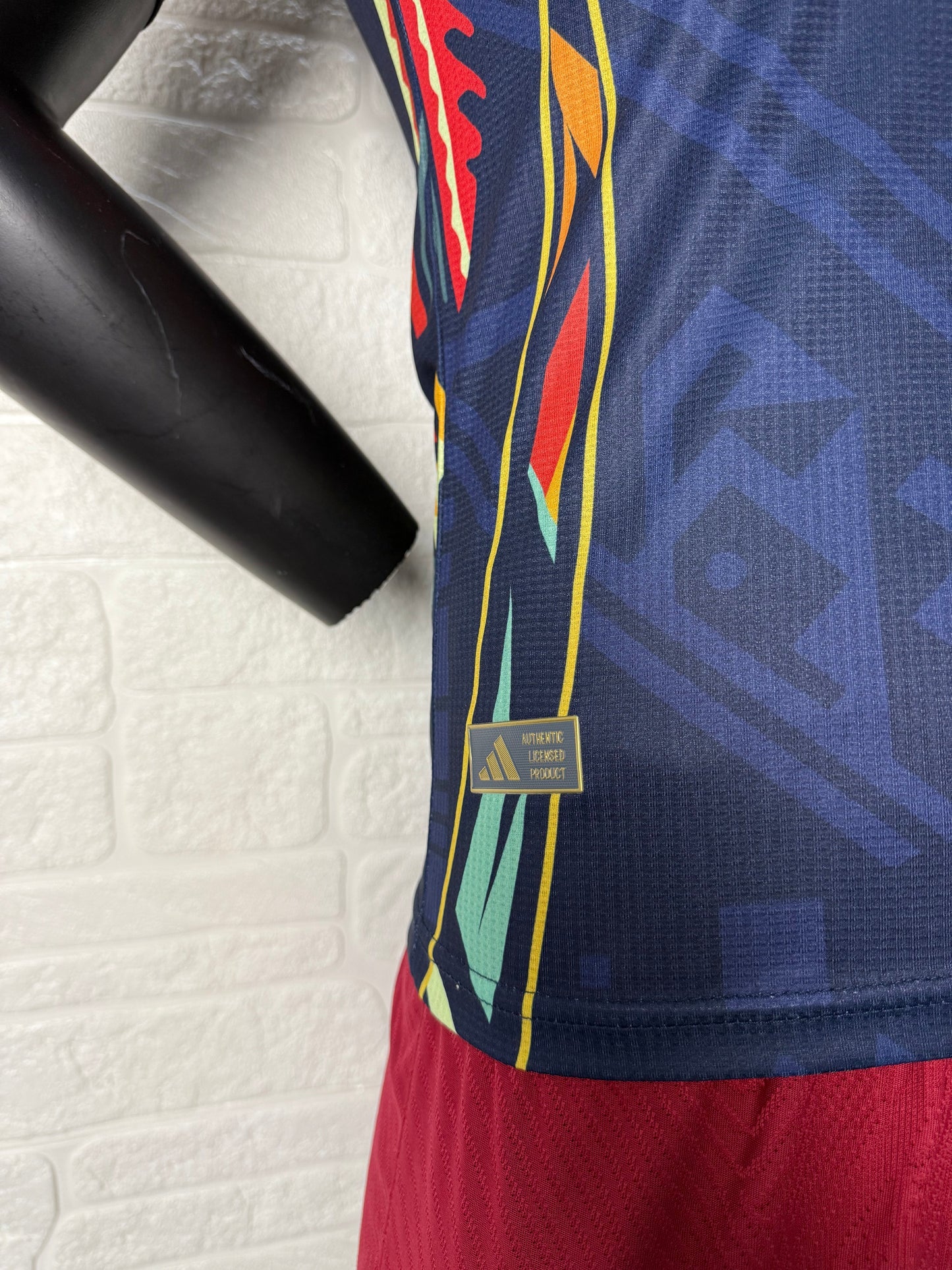 2025/26 Club América Training Player Version Jersey - Dark Navy Blue Body Multicolour Aztec Zigzag Graphic Upper Chest -Gold Three Stripes - Club América Crest - Caliente Principal Sponsor