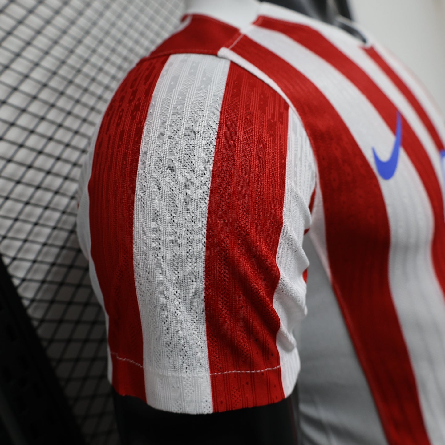 2025/26 Atlético de Madrid Home Player Version Jersey -  Red & White Vertical Wide Stripe - White V-Neck Collar - Blue Nike Swoosh - Atlético Crest - Riyadh Air Blue Sponsor